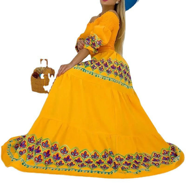 Dame Maxikjole med elastisk Off-Shoulder-udskæring og farverige broderier Stilla