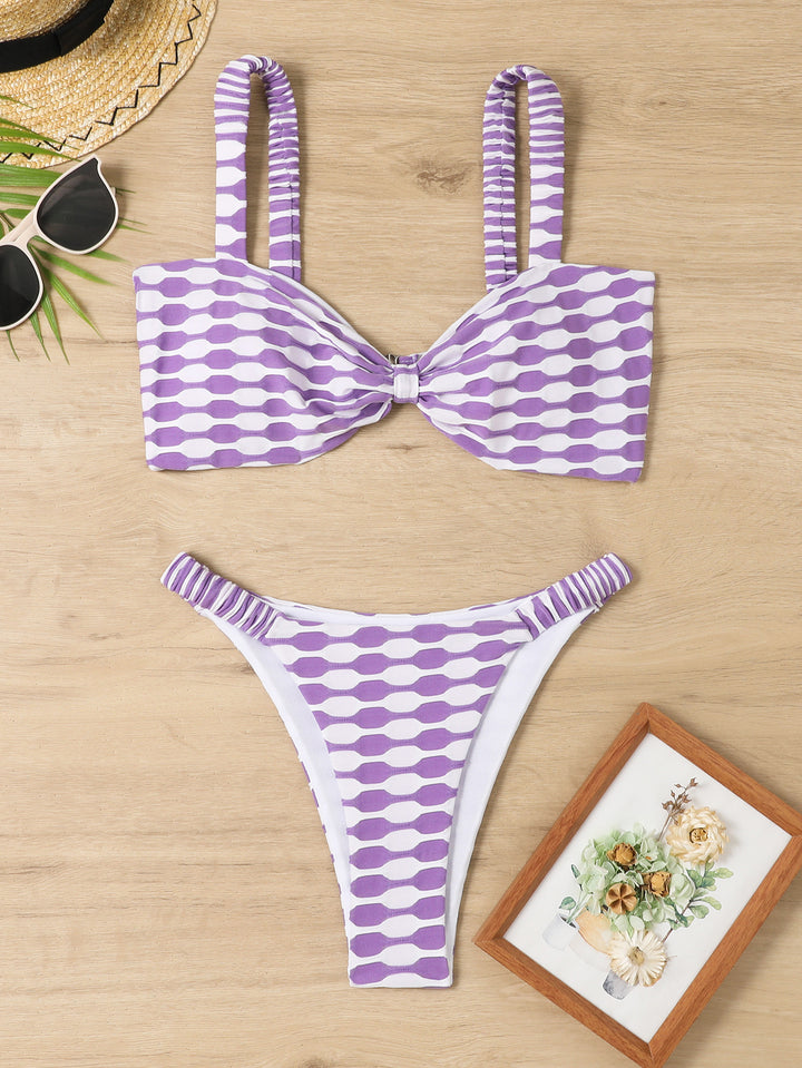 Damebikini med fashionable design og legende knapdetalje Stilla