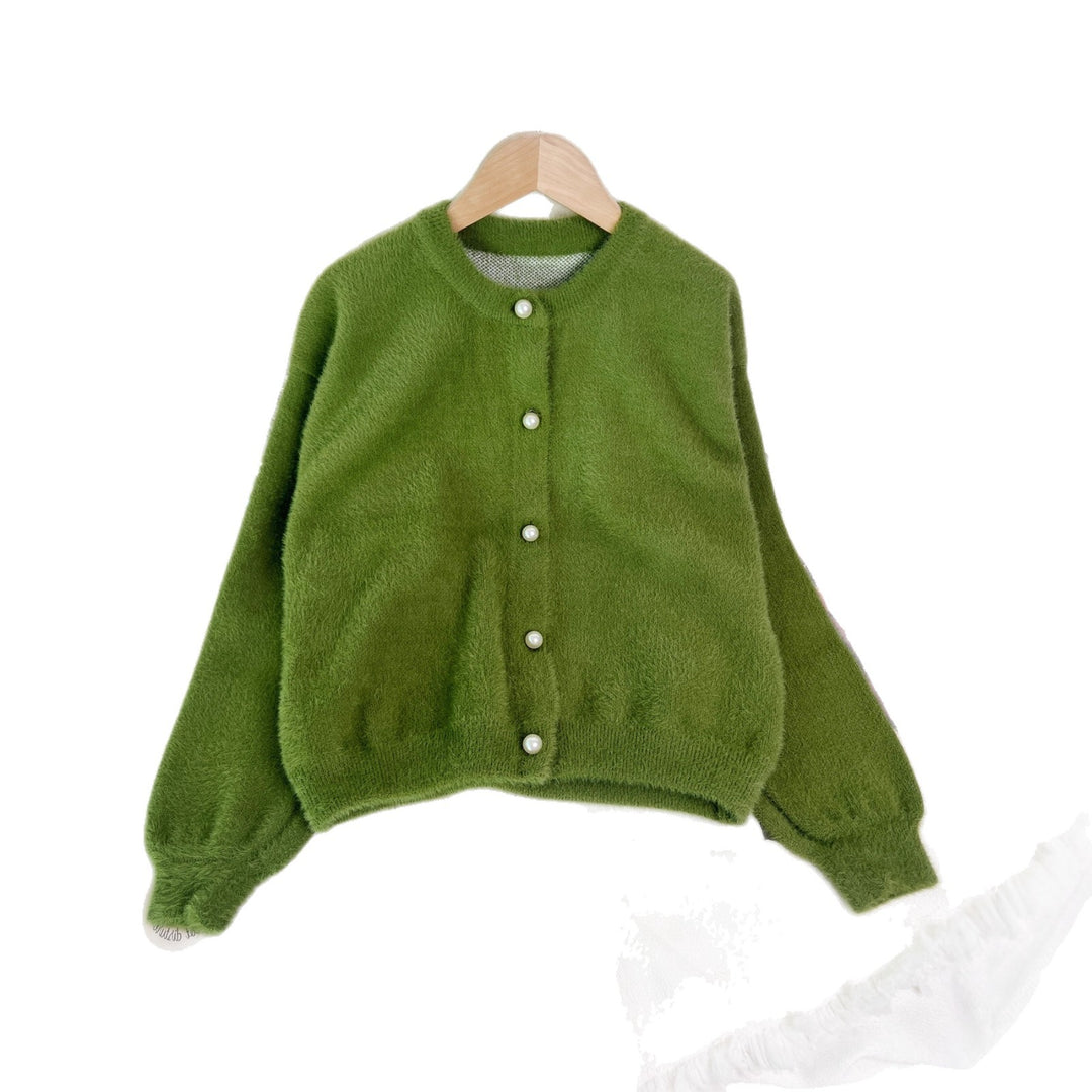 Kvindernes hyggelige cardigan med perlebesatte knapper og moderne snit Stilla