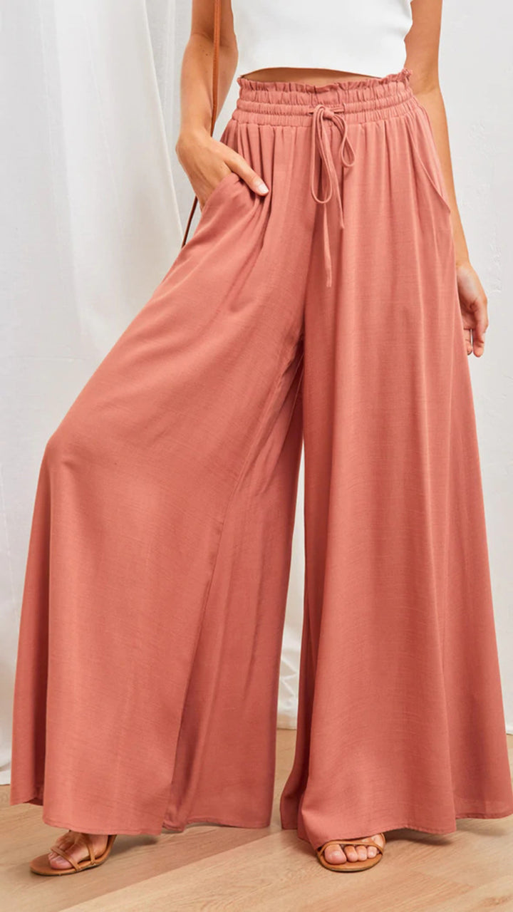 Dame bredt skårne Palazzo-bukser med elastisk talje og praktiske lommer Stilla