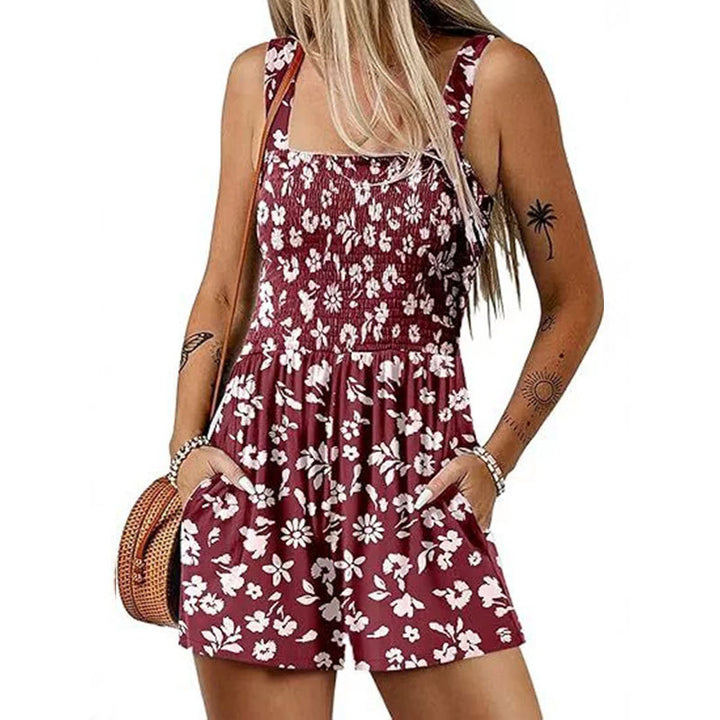 Dame jumpsuit med florale detaljer og praktiske lommer Stilla