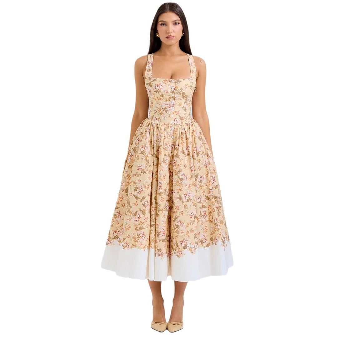 Dame Midikjole i vintage-stil med blomstertryk og svajende skørt Stilla