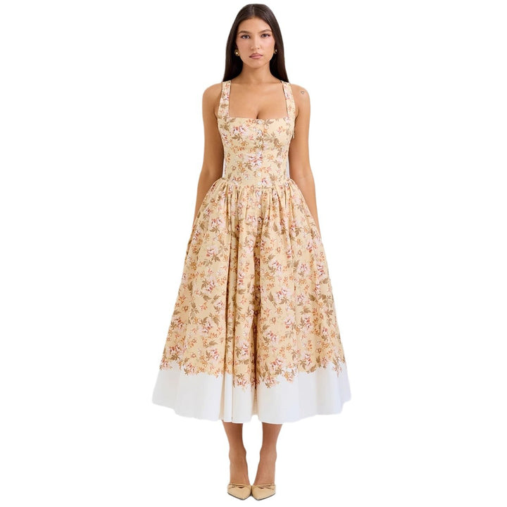 Dame Midikjole i vintage-stil med blomstertryk og svajende skørt Stilla