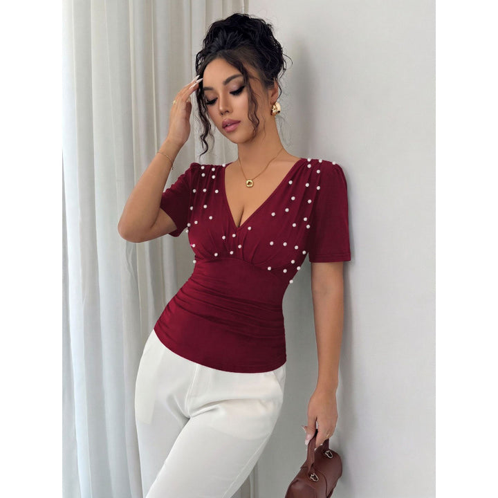 Dame elegant bluse med perle-detalje Skovae