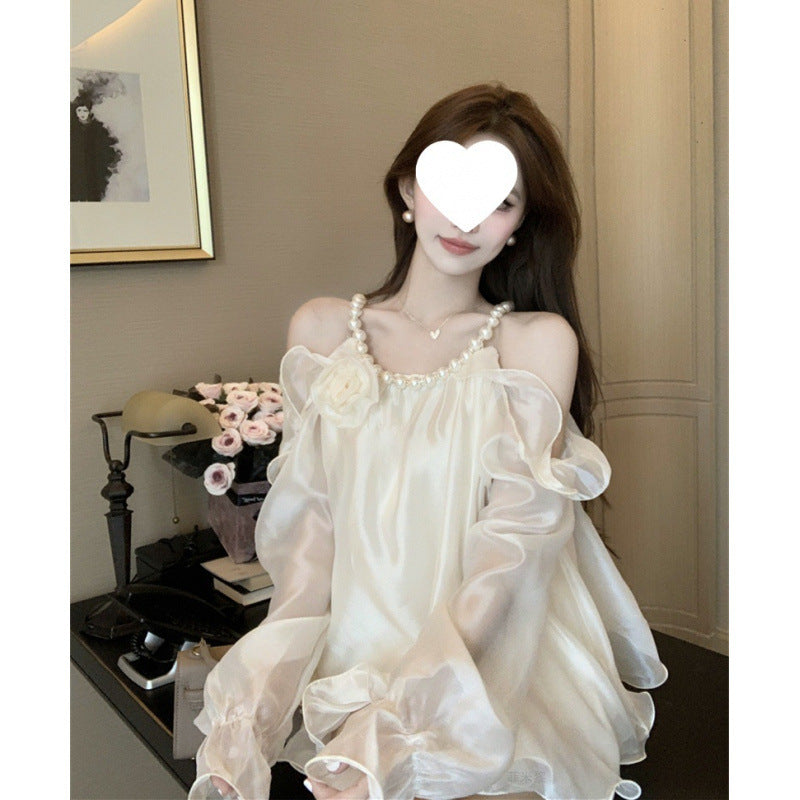 Dame Elegant Off-Shoulder Bluse med Rufflesleeves og floral accent Stilla