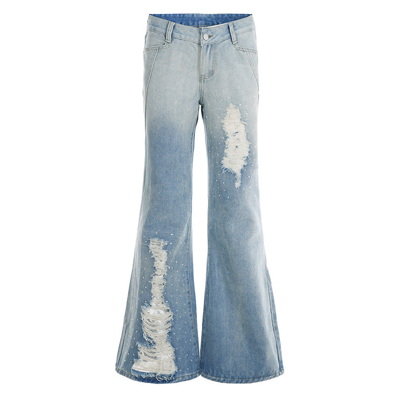 Dame Schlagjeans med moderigtige destroyed-detaljer og komfortabel pasform Skovae