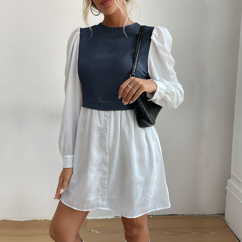 Dame mode skjortekjole med elegante puffærmer og knapbar front Stilla