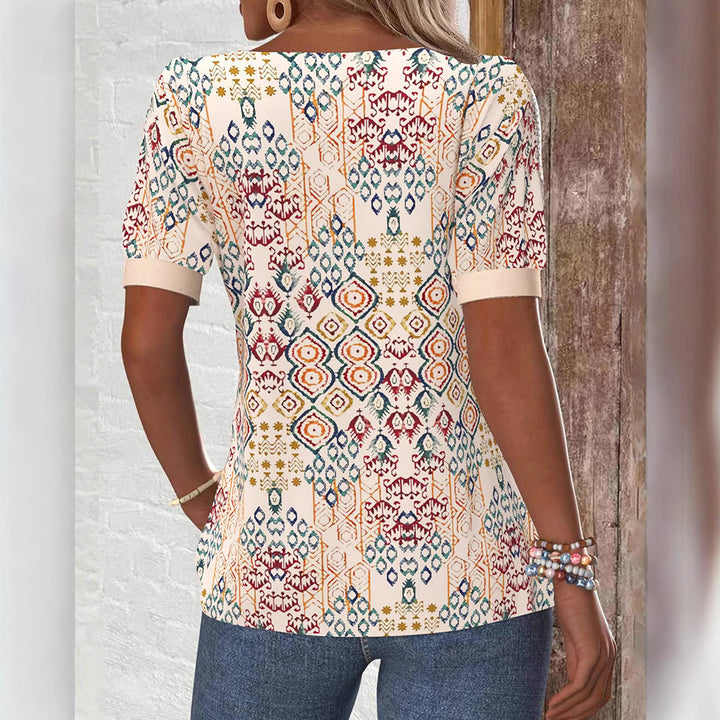 Dame Blusenshirt med struktureret grafikdesign og elegante knapdetaljer Stilla