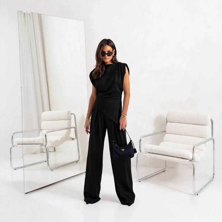 Dame Elegant overall-sæt med asymmetrisk design og brede ben Stilla