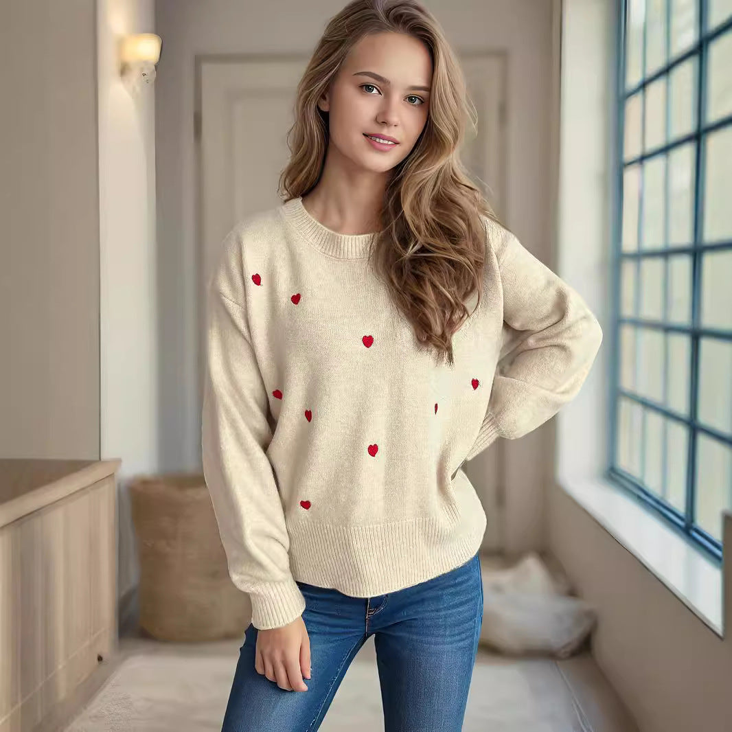 Kvinders sweater med legesyg hjerte mønster og afslappet pasform Stilla