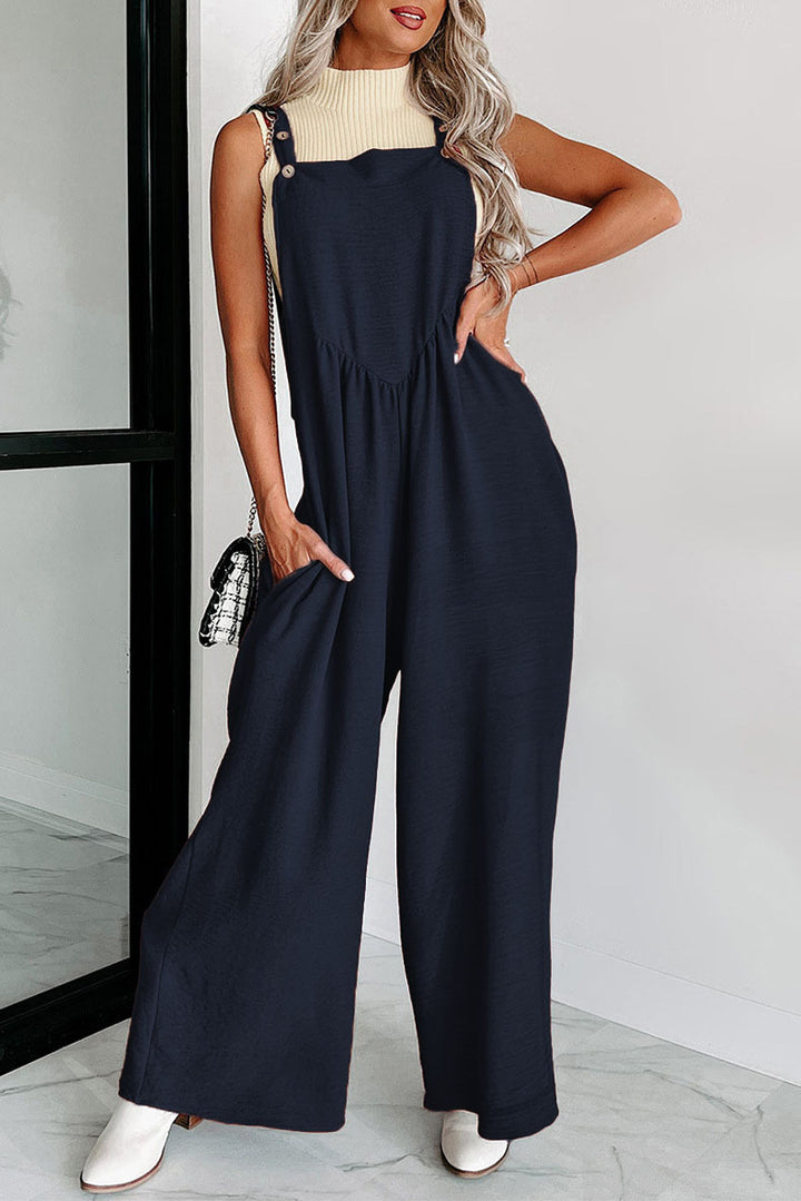 Damer over størrelse jumpsuit med bredt ben og elegante detaljer Stilla