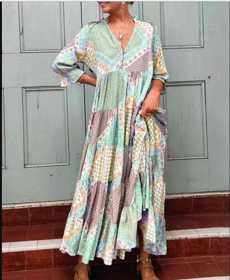 Dame maxidedragt med unikt patchwork-design og sidelommer Stilla
