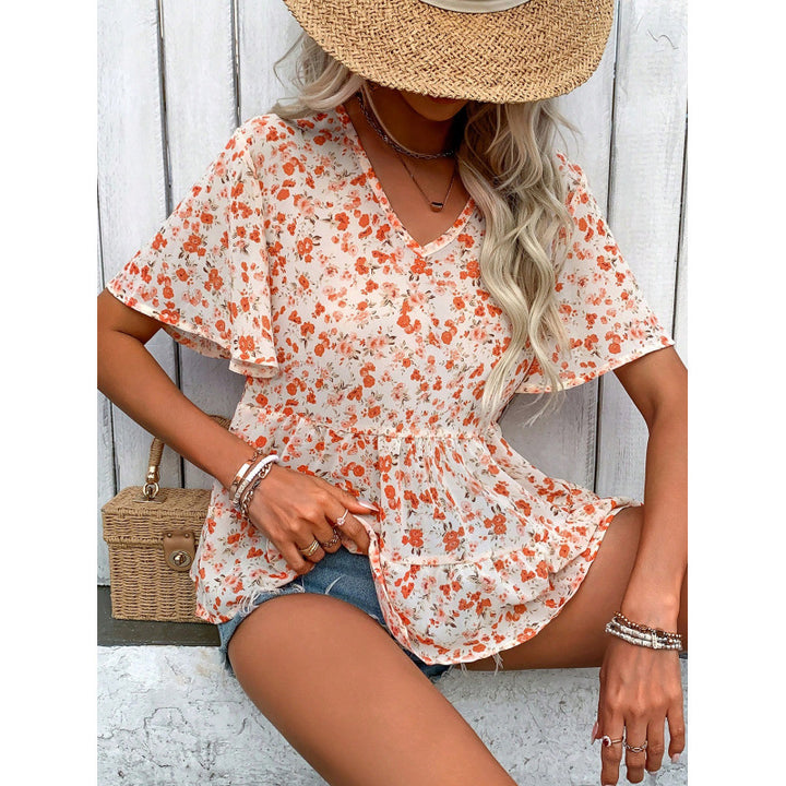 Damebluse med flæse-snit og blomsterprint Skovae