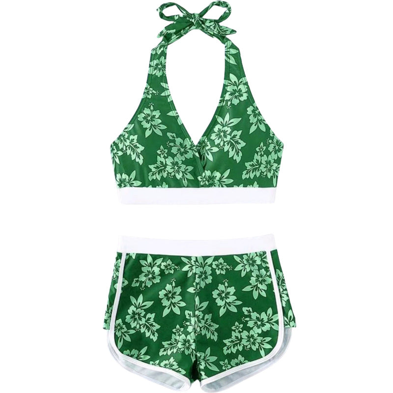 Dame Mode Bikini-sæt med blomster-halter-top og sporty shorts Stilla