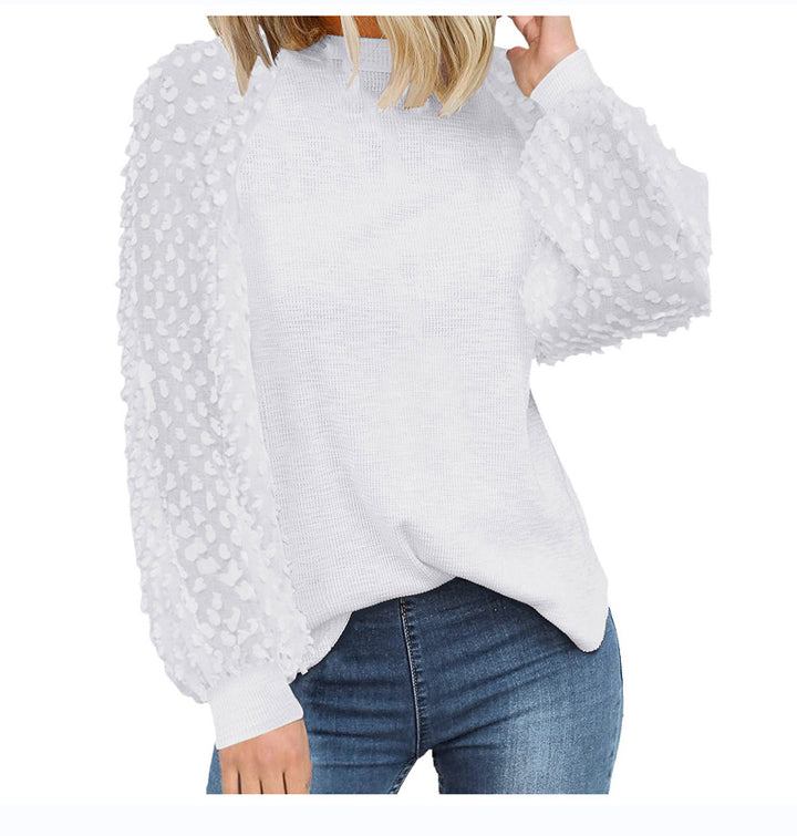 Dame strikpullover med transparente pufærmer Stilla