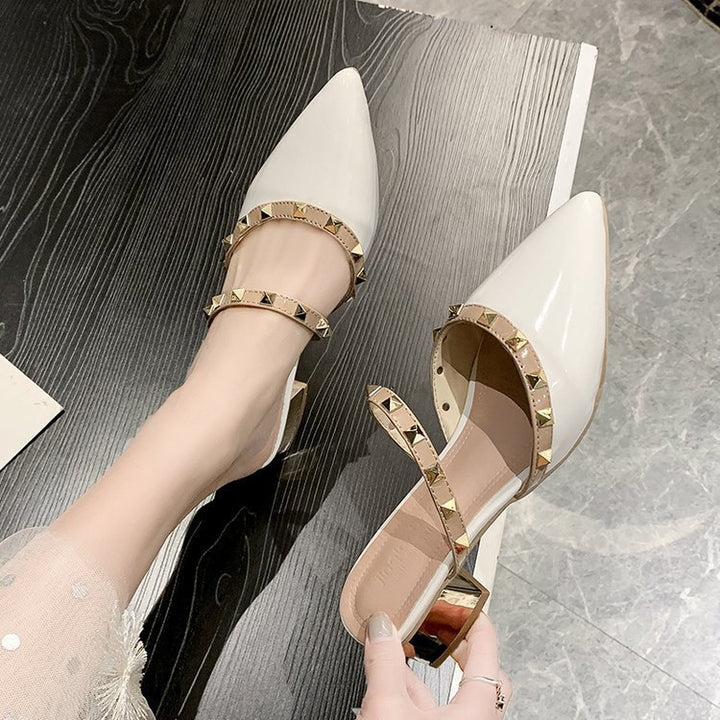 Dame Slingback-pumps med modigt spids-design og skinnende vintage-nitter Stilla