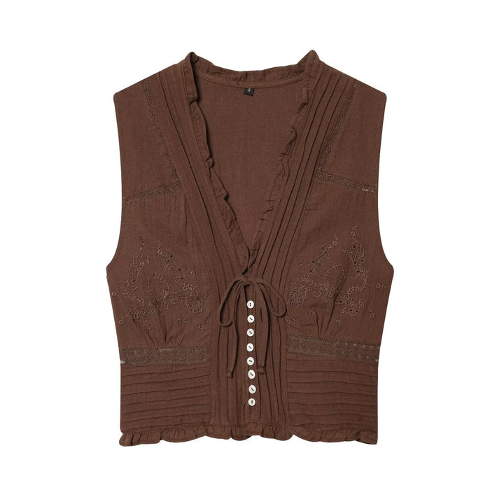 Dame Blusenshirt med fin drapering og dekorative knapdetaljer Skovae