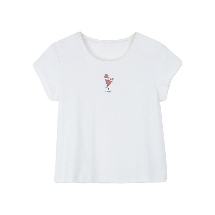 Damer casual top med blomstret design og svajende volangskørt Stilla
