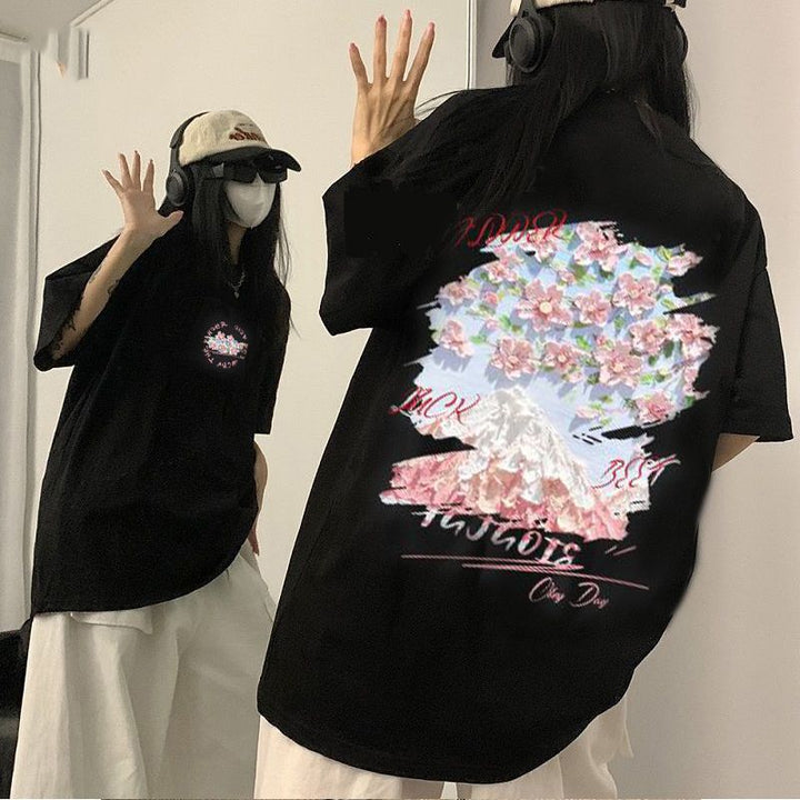 Dame T-shirt med kunstnerisk bjerg- og blomstermotiv Stilla
