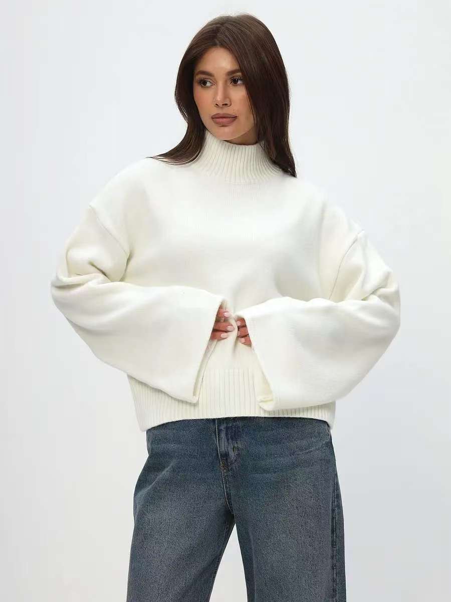 Kvindernes chunky strikket sweater med stående krave og voluminøse ærmer Stilla