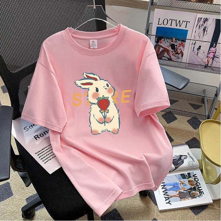 Dame T-shirt med glad tegneserie-kaninmotiv og kreativ tekst Stilla