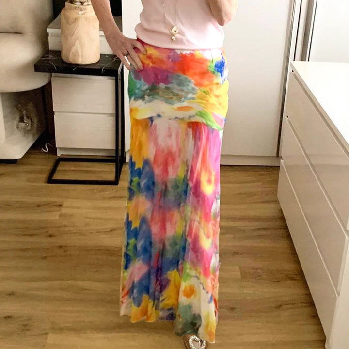 Dame Maxikjole med elegant blomsterprint og flydende snit Skovae