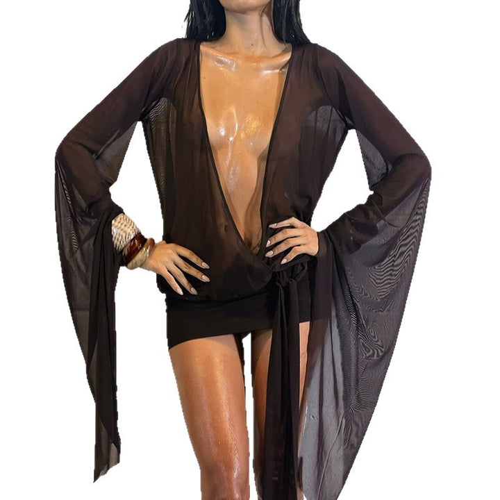 Dame indpakningsbluse med transparente ærmer og figurskabende design Skovae