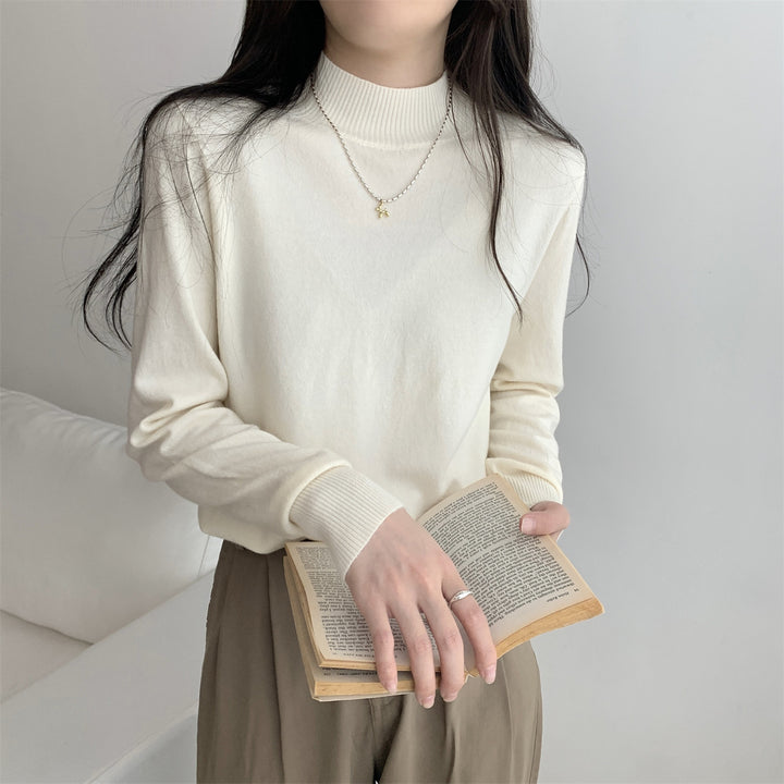 Dame finstrikket sweater med moderne ståkrave og afslappet pasform Stilla