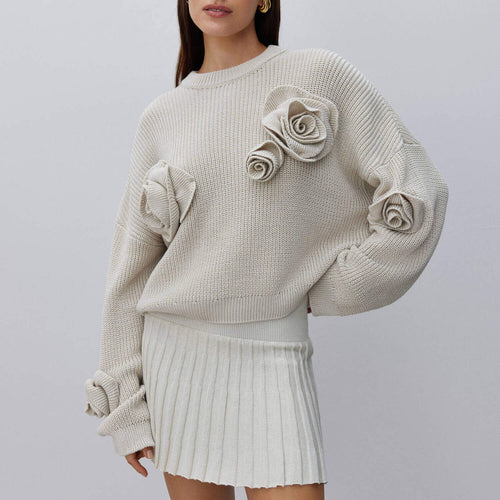 Dame strikpullover med innovative blomsterapplikationer Stilla
