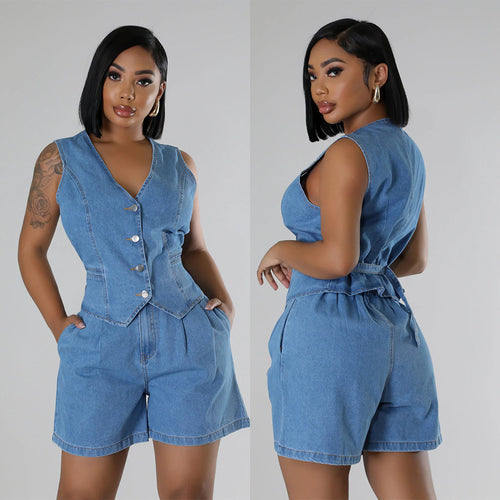 Dame Denim- jumpsuit med tætsiddende pasform og knapdesign Stilla