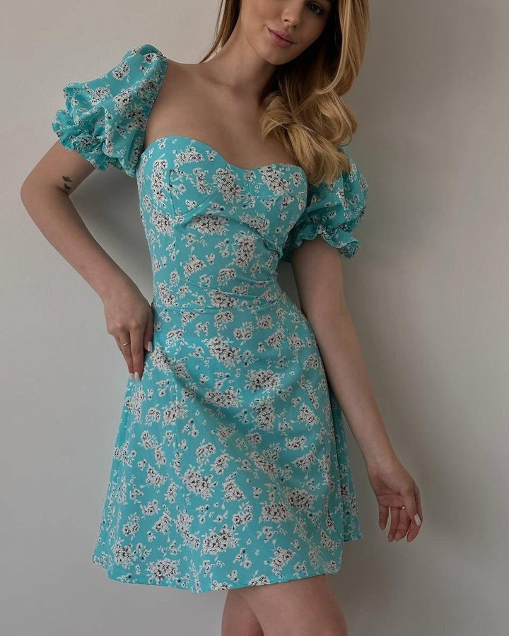 Dame sommerkjole i legende blomsterdesign med puffærmer Stilla