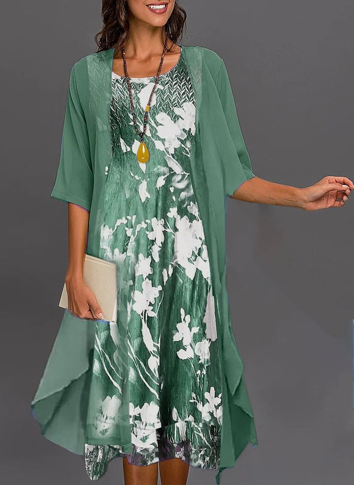 Dame elegant fritidskjole med asymmetrisk kant og floral design Stilla