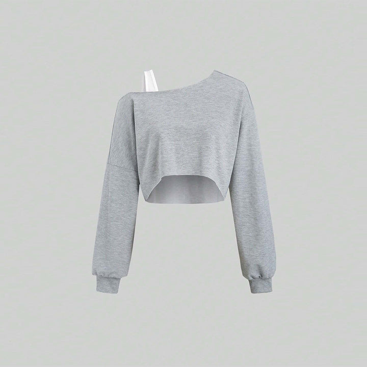 Kvindernes cropped sweatshirt med asymmetrisk design og voluminøse ærmer Stilla