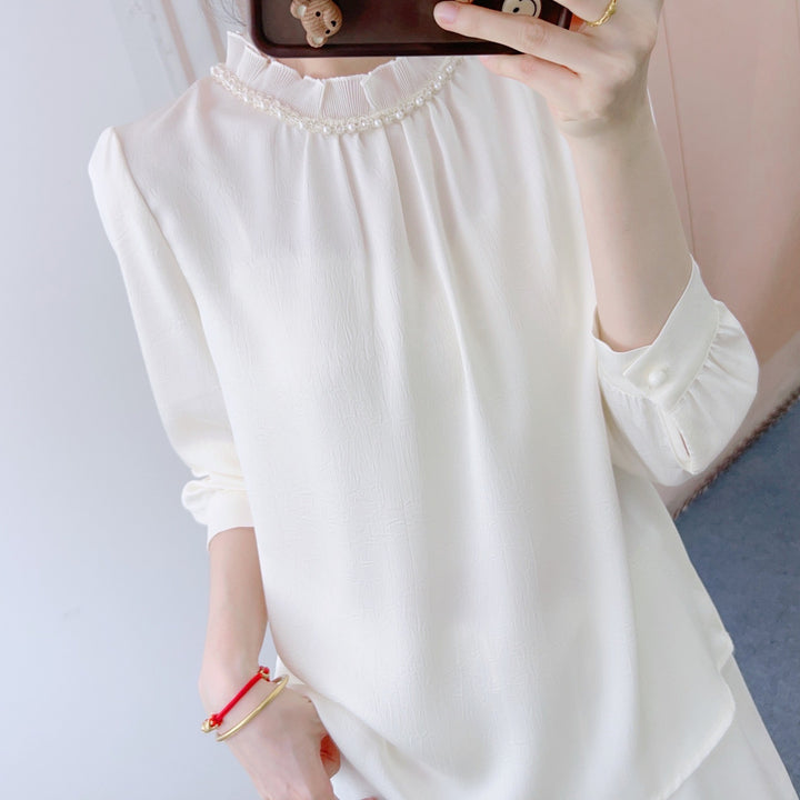 Dame elegant bluse med perlebesat krave og afslappet snit Stilla
