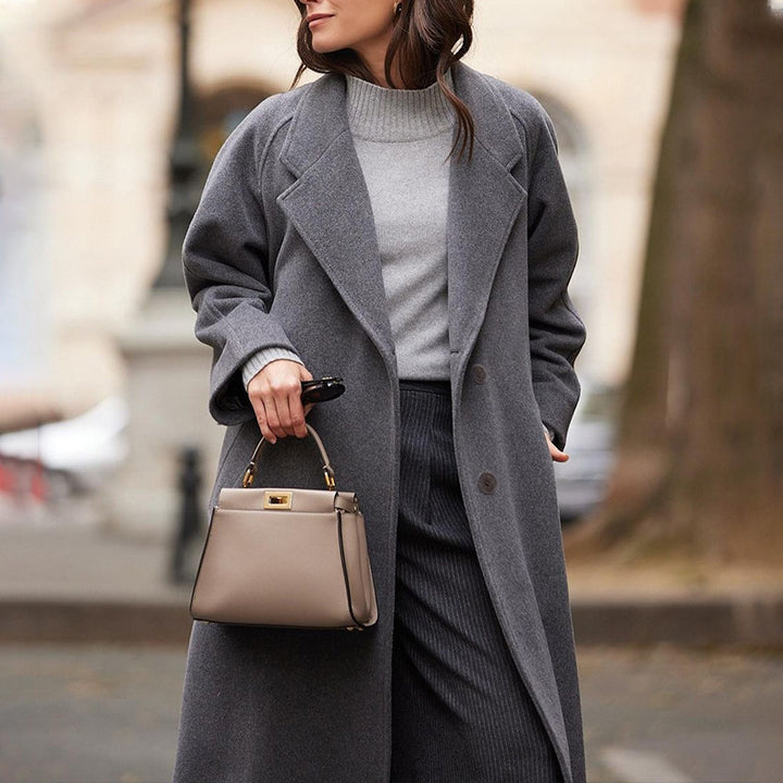 Dame Elegant Uldfrakke i Oversized-snit med dyb revers og praktiske lommer Stilla