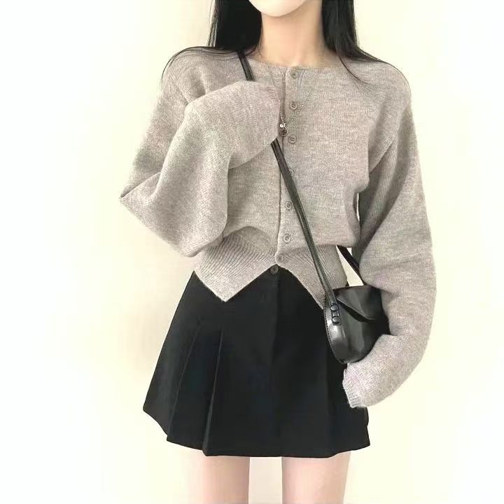 Kvinderne cropped cardigan med knaplukning og oversized ærmer Stilla