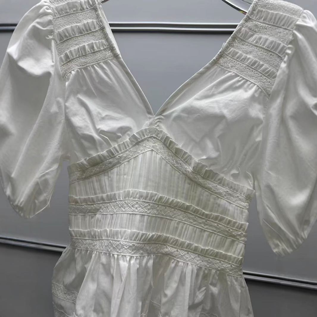 Damebluse med voluminøse ærmer og raffinerede hæklede dekorationer Stilla