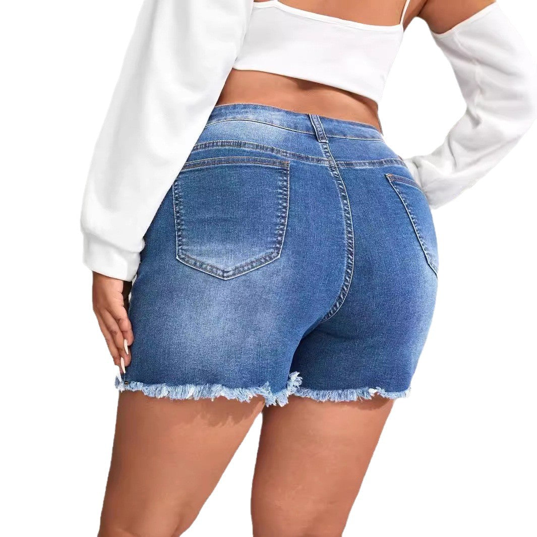 Dame fashionable destroyed denim shorts med perleapplikationer og frynset kant Stilla