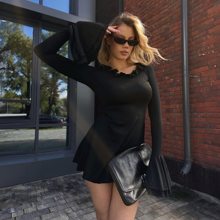 Dame elegant top med voluminøse flæsedetaljer Stilla