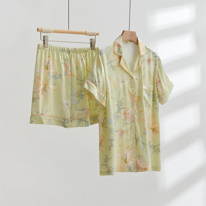 Dame Pyjama-sæt med blomsterdesign og elegant snit Stilla