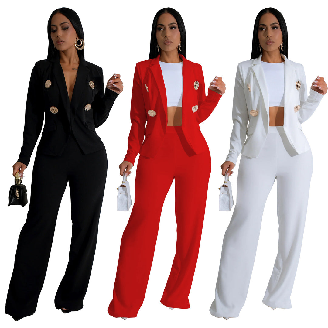 Dame elegant jumpsuit med skinnende knapdetaljer og dyb udsnit Stilla