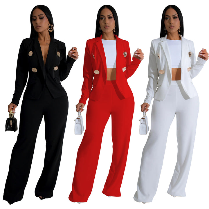 Dame elegant jumpsuit med skinnende knapdetaljer og dyb udsnit Stilla