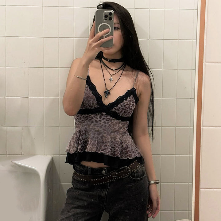 Dame Peplum-top med spidsdetaljer og elegant leopardmønster Stilla