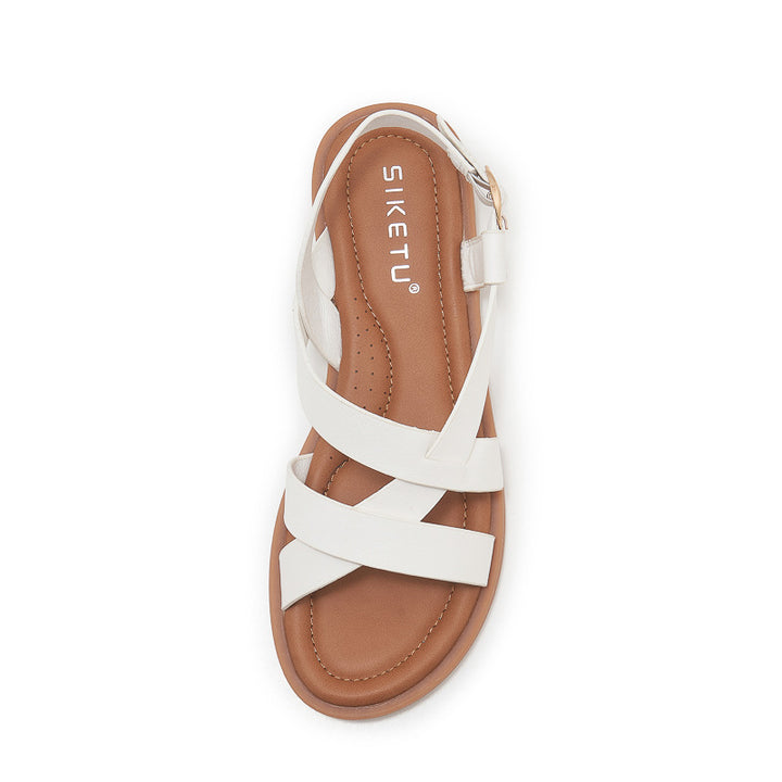 Dame sandaler med elegant krydsrem og justerbar hælrem Stilla