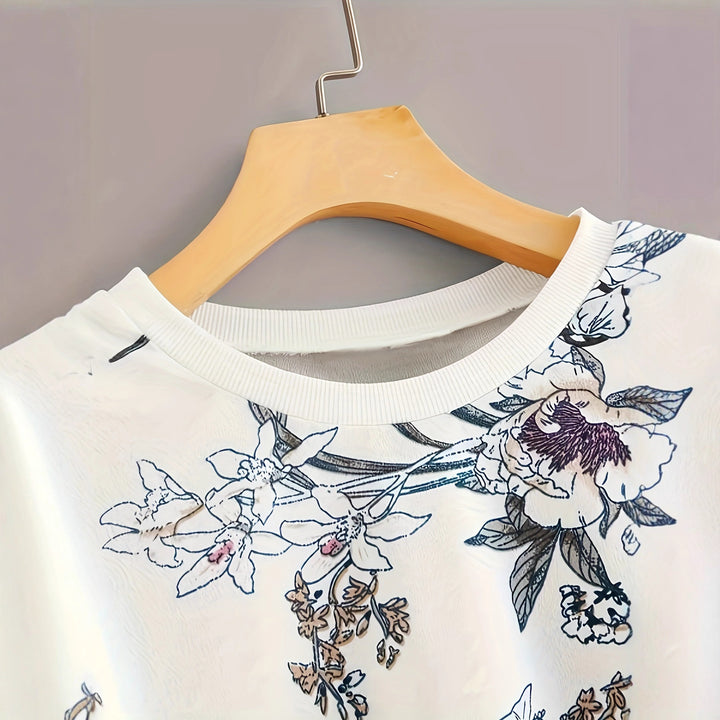 Kvinders træningstrøje med blomsterprint og afslappet pasform Stilla