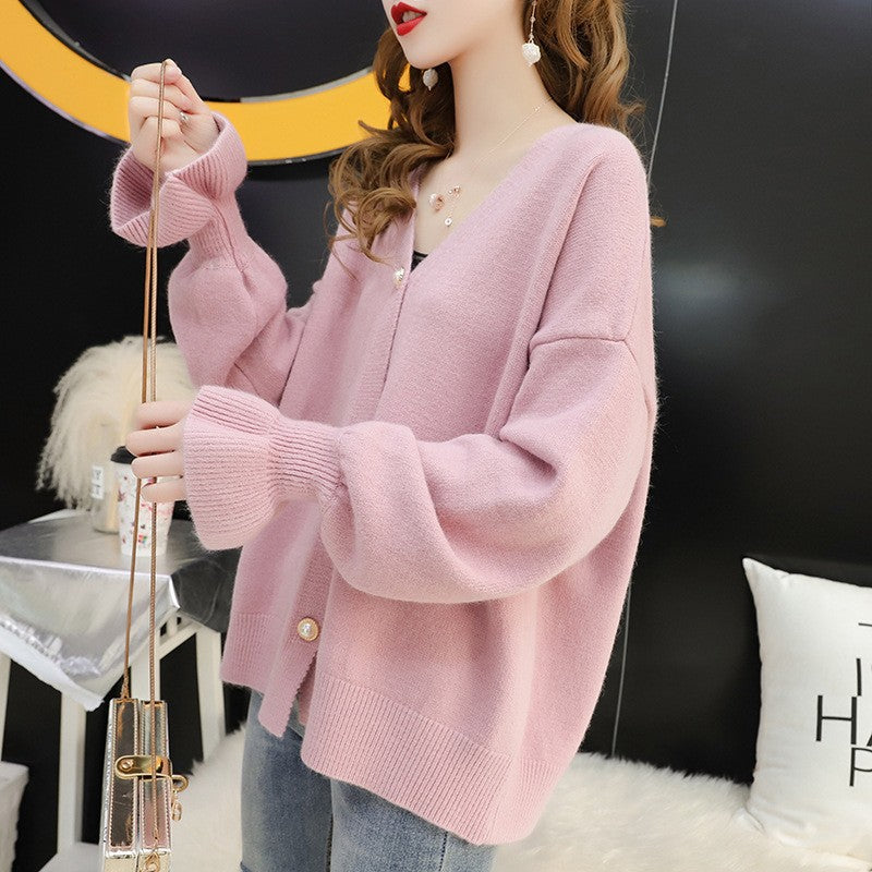Kvinders cardigan med elegante perleknapper Stilla
