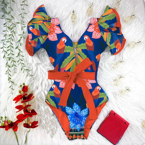 Dame enhed badedragt med blomstret design og elegante flæsedetaljer Stilla