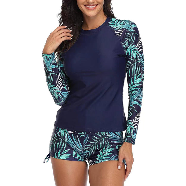Dame rashguard-sæt med blomsterprint og sporty design Stilla