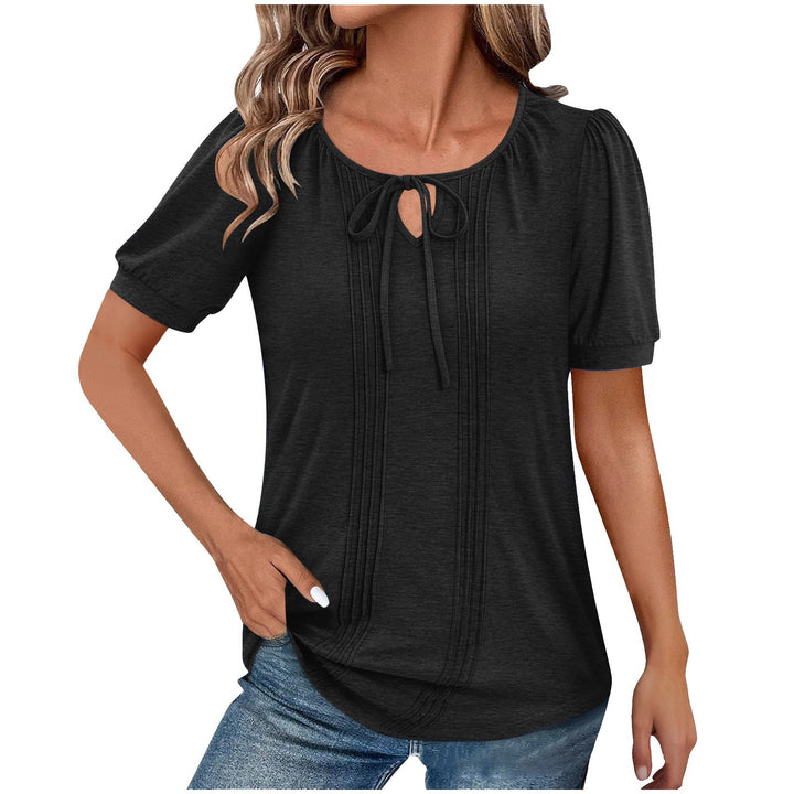Damebluse med puffærmer og raffineret halterneck Stilla