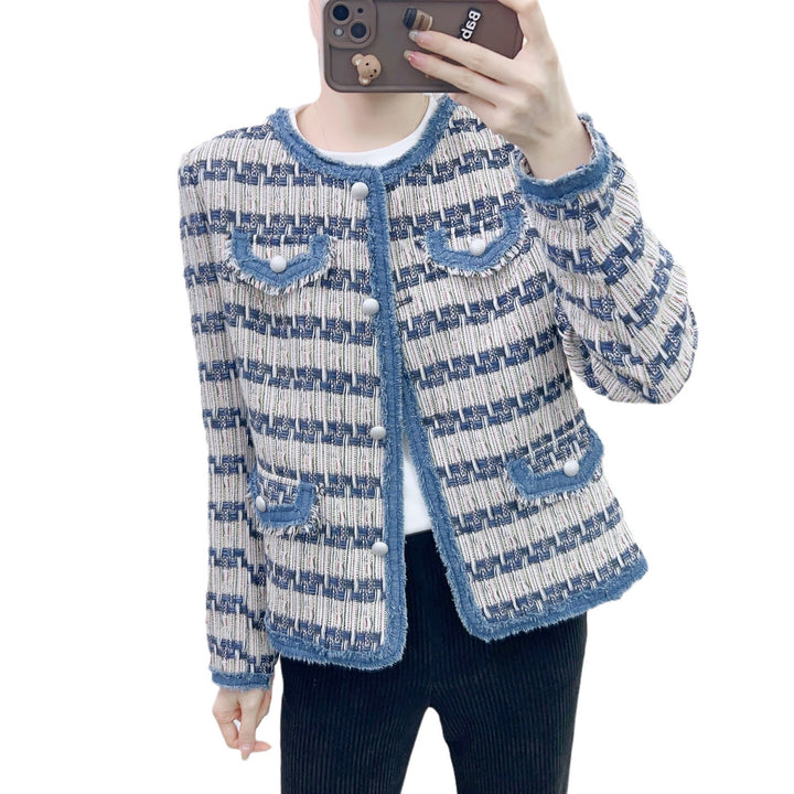 Dame mode Bouclé-jakke med struktureret design og elegante knapdetaljer Stilla
